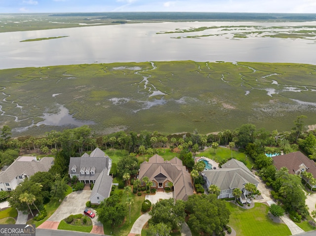 bird's eye view with a water view and a residential view