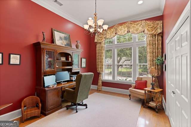 office with a chandelier, wood finished floors, visible vents, and crown molding