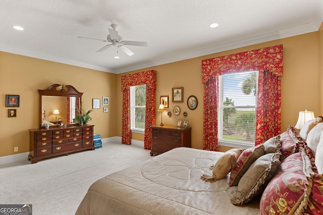 carpeted bedroom featuring ornamental molding and baseboards