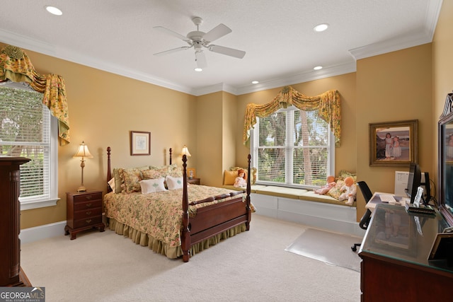 carpeted bedroom with recessed lighting, crown molding, and ceiling fan