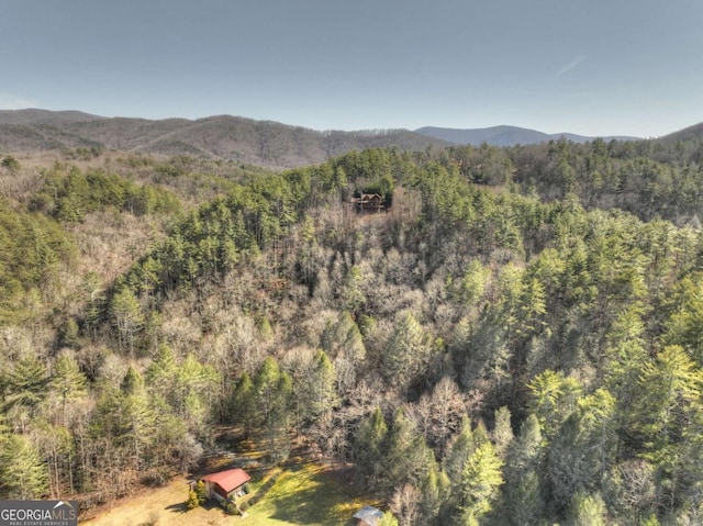 property view of mountains with a forest view