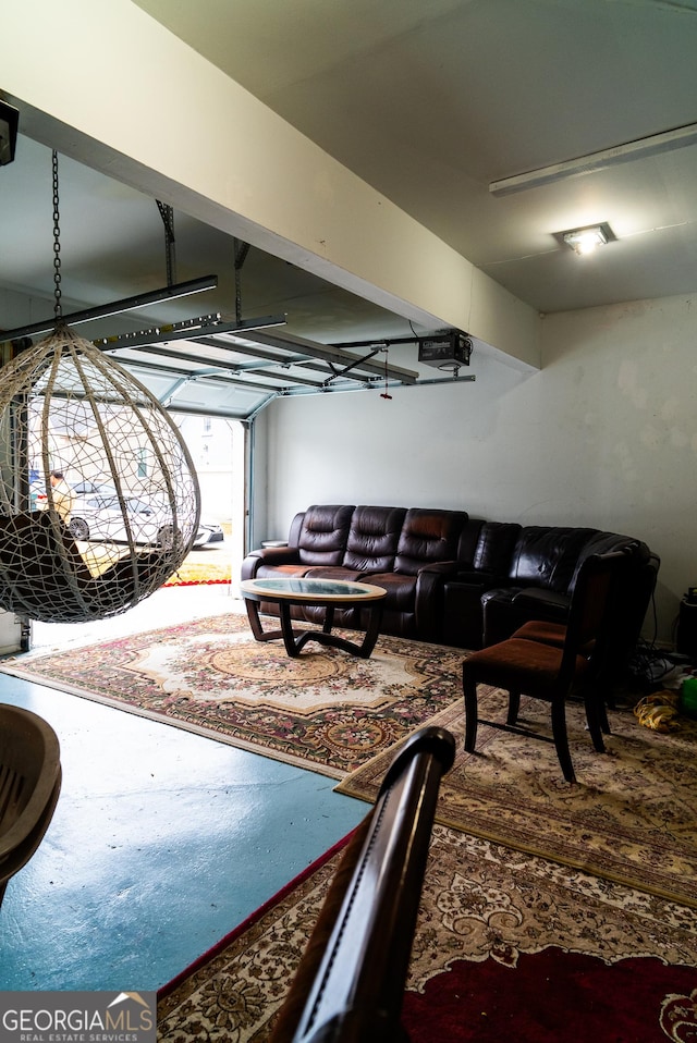 living area with a garage and concrete flooring