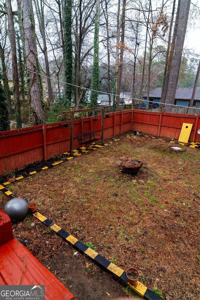 view of yard with a fenced backyard