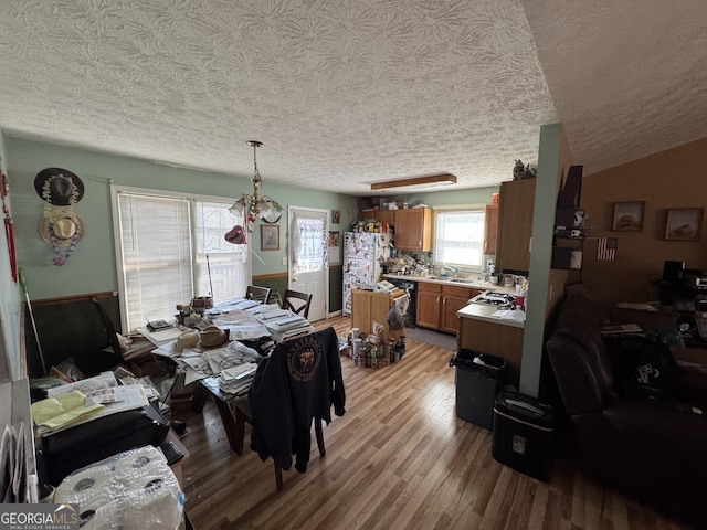 dining area featuring light wood-style flooring