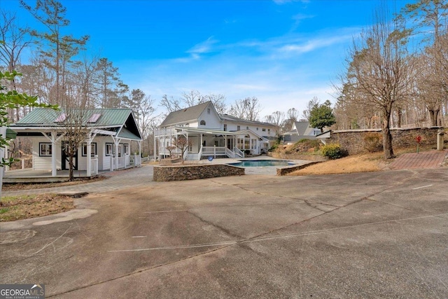 exterior space featuring covered porch