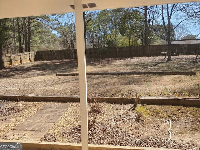 view of yard featuring a fenced backyard