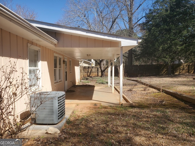 exterior space featuring central air condition unit and a fenced backyard