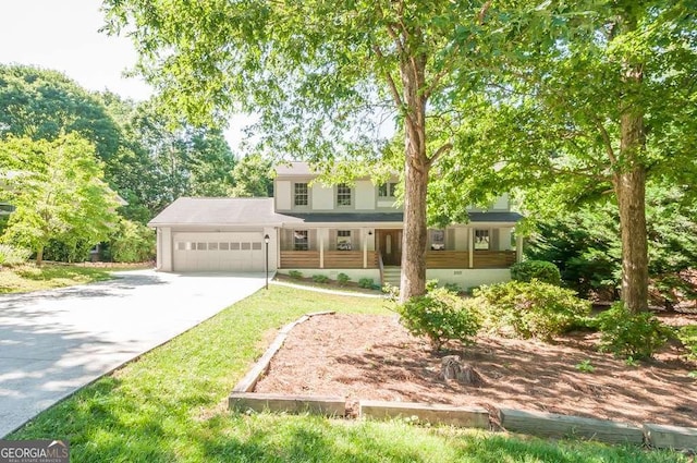 view of front facade featuring an attached garage and concrete driveway