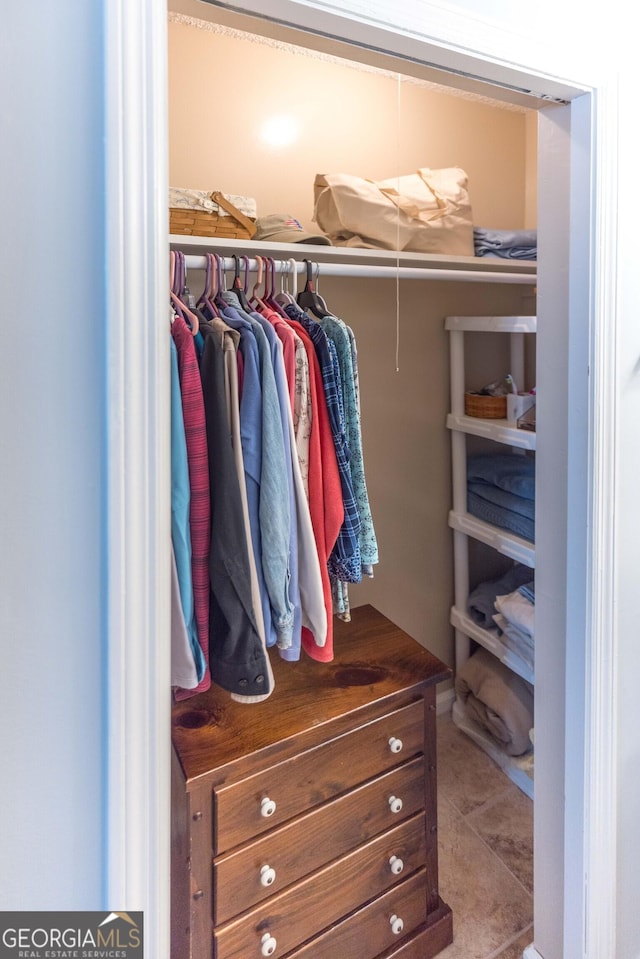 spacious closet with tile patterned flooring