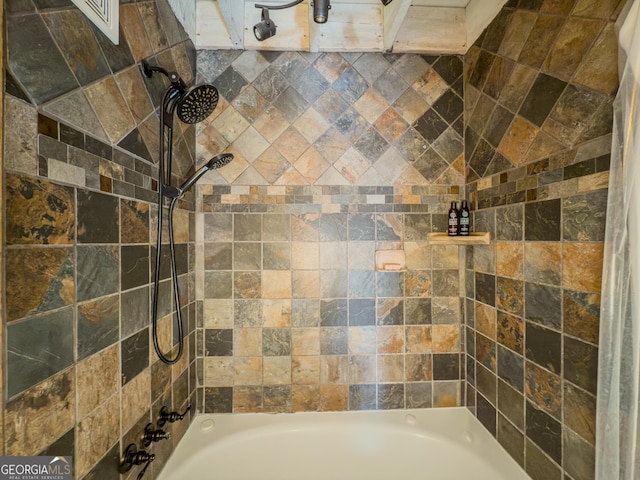 bathroom with shower / bath combination