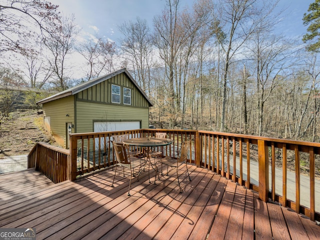 wooden deck with an outdoor structure