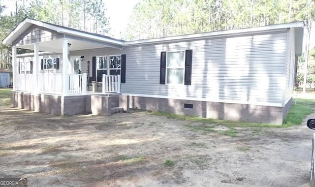 exterior space featuring covered porch