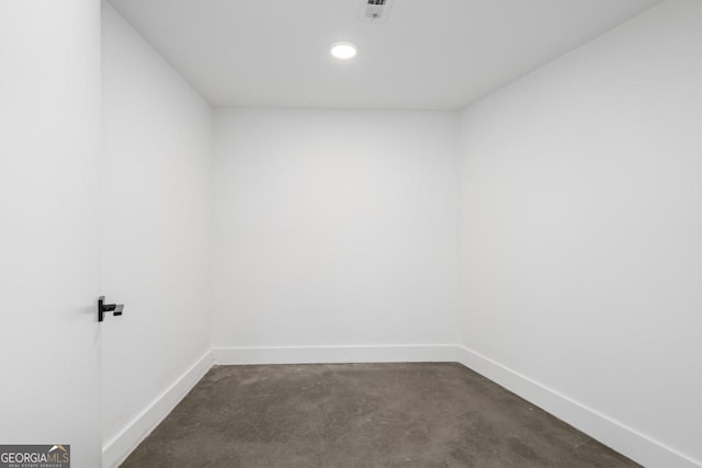 interior space with recessed lighting, unfinished concrete flooring, visible vents, and baseboards