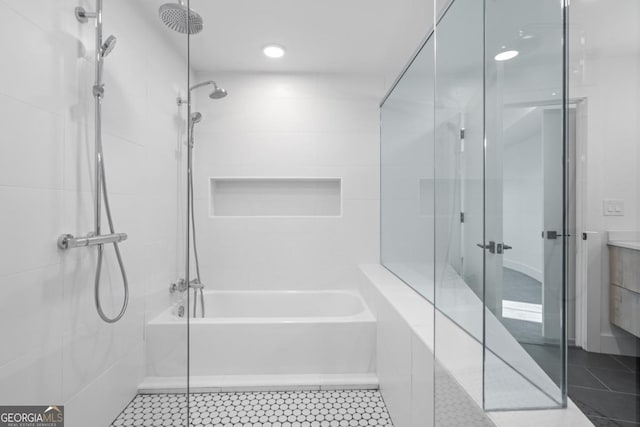 bathroom with tile patterned floors