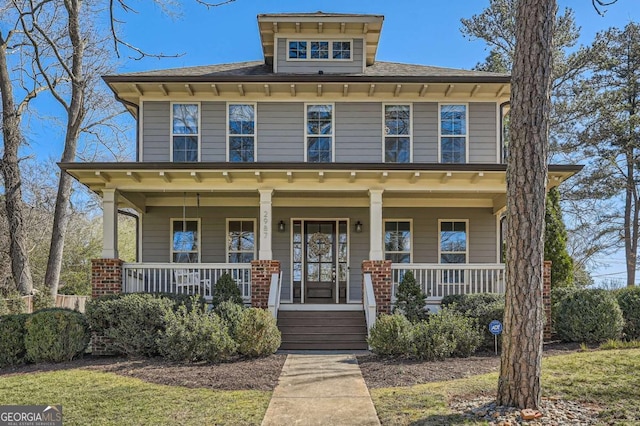 traditional style home with covered porch