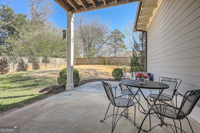 view of patio / terrace featuring outdoor dining area and a fenced backyard