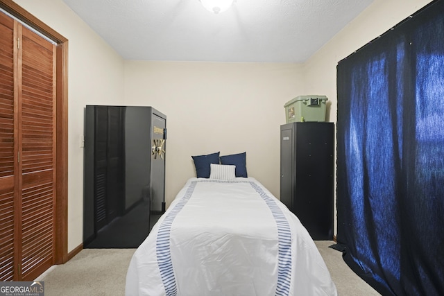 carpeted bedroom with baseboards