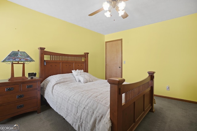 carpeted bedroom featuring a ceiling fan and baseboards