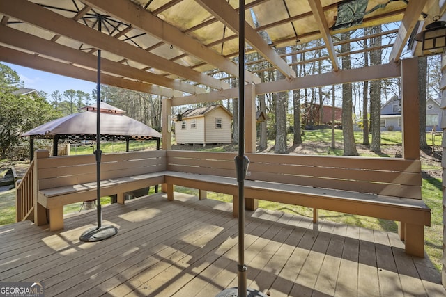 wooden deck featuring a gazebo