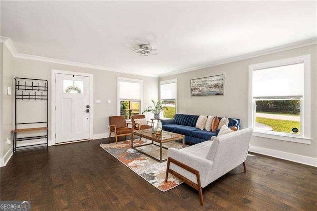 living area with baseboards, dark wood finished floors, and crown molding