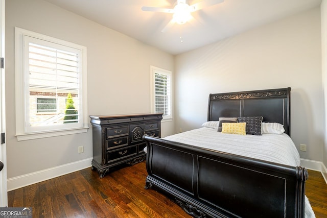 5230 Harris Springs Dr, Cumming, GA 30040 - bedroom with dark wood finished floors, baseboards, and a ceiling fan