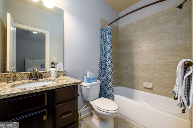 5230 Harris Springs Dr, Cumming, GA 30040 - bathroom featuring vanity, shower / bath combo with shower curtain, and toilet