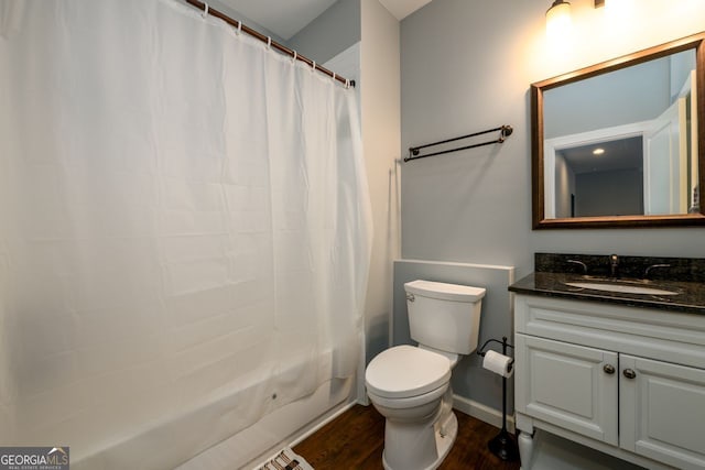 5230 Harris Springs Dr, Cumming, GA 30040 - full bath with wood finished floors, vanity, toilet, shower / bath combination with curtain, and baseboards