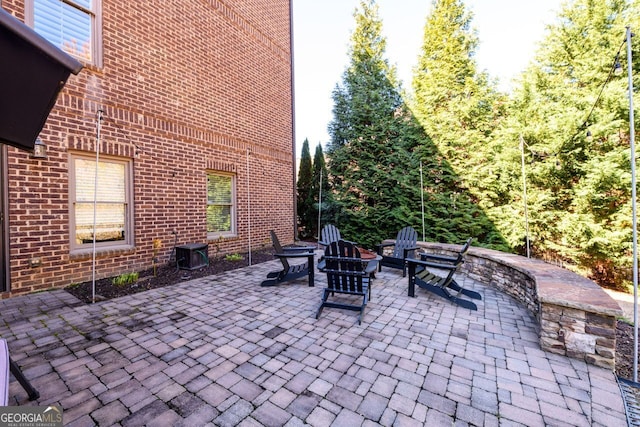 5230 Harris Springs Dr, Cumming, GA 30040 - view of patio with an outdoor fire pit