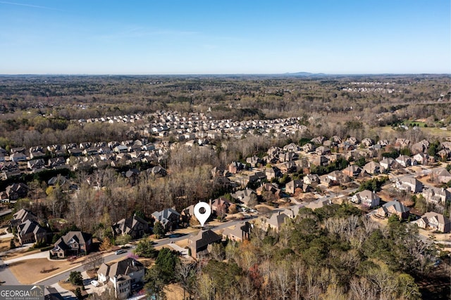 5230 Harris Springs Dr, Cumming, GA 30040 - aerial overview of property's location featuring nearby suburban area and a forest