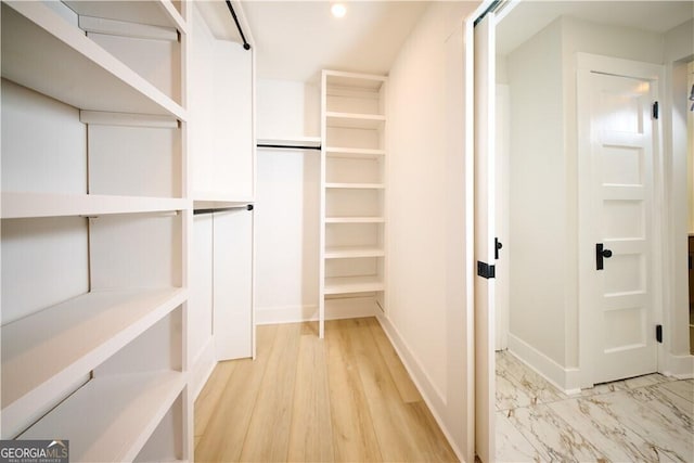 view of walk in closet