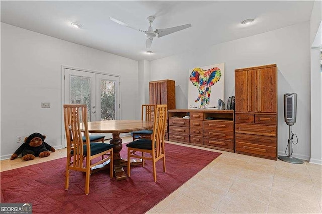 dining area featuring french doors, ceiling fan, baseboards, and light tile patterned floors