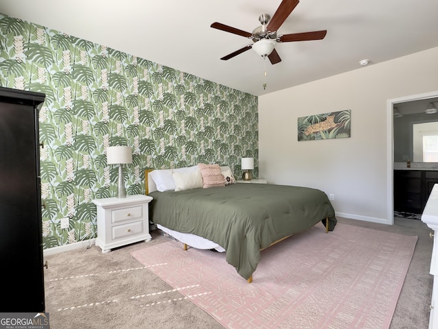 carpeted bedroom featuring a ceiling fan, baseboards, and wallpapered walls