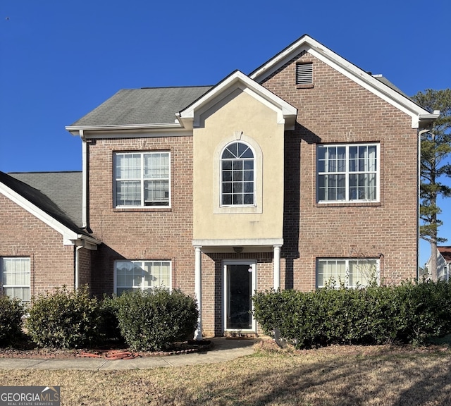 view of front of property with brick siding