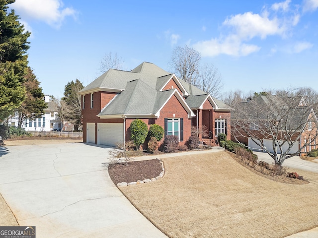 view of front facade featuring an attached garage, roof with shingles, concrete driveway, and brick siding