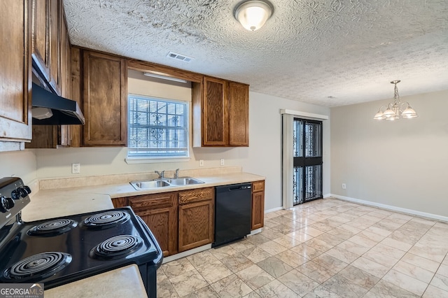 kitchen featuring black appliances, visible vents, light countertops, and a sink