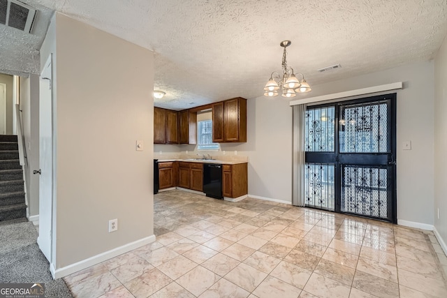 kitchen with black dishwasher, visible vents, baseboards, an inviting chandelier, and light countertops