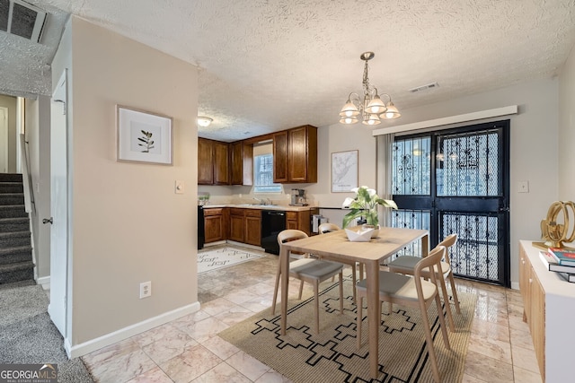 dining area with visible vents, stairway, baseboards, and a textured ceiling