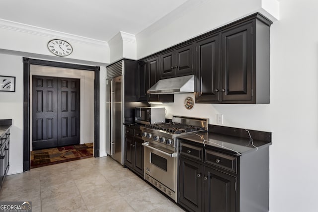 kitchen with black microwave, under cabinet range hood, ornamental molding, high end stainless steel range oven, and dark countertops