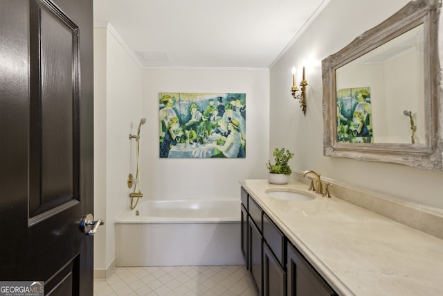 bathroom featuring ornamental molding, a garden tub, vanity, and tile patterned floors