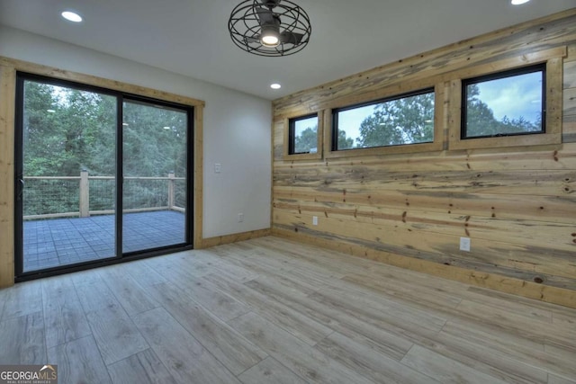 2634 Mountain View Rd, Mccaysville, GA 30555 - unfurnished room featuring wooden walls, recessed lighting, and wood finished floors