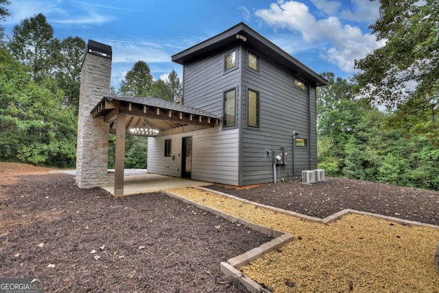 rear view of house featuring a patio