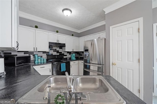 kitchen with stainless steel appliances, dark countertops, white cabinets, and under cabinet range hood