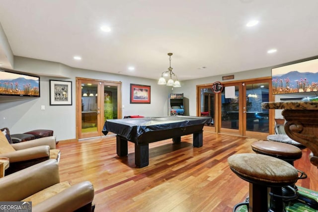 rec room with light wood-style floors, recessed lighting, pool table, and french doors