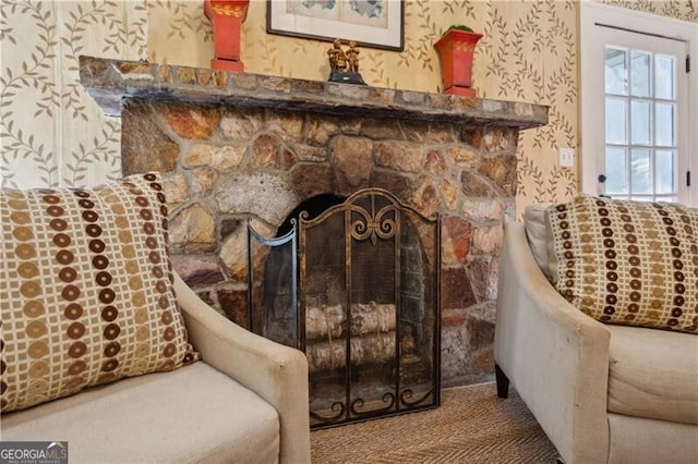 details with carpet floors, a fireplace, and wallpapered walls