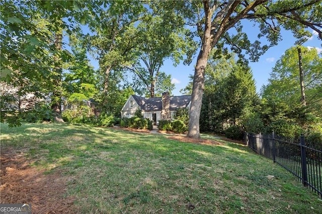 view of yard with fence