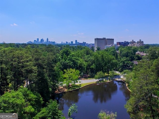 bird's eye view with a view of city and a water view