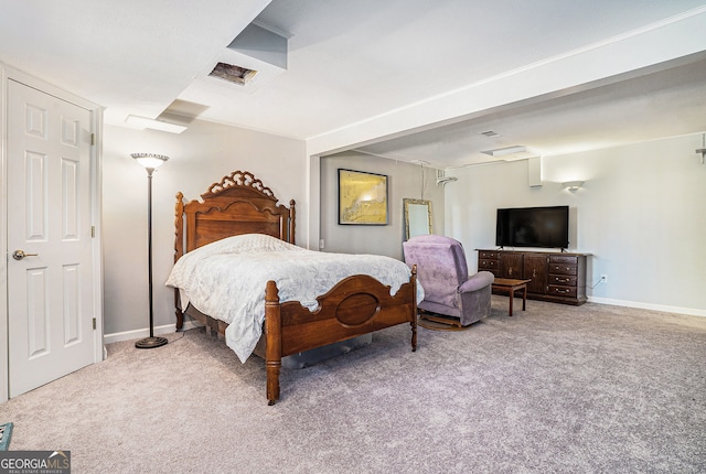 carpeted bedroom with baseboards