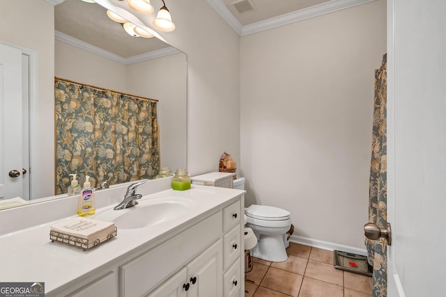 bathroom featuring toilet, vanity, visible vents, ornamental molding, and tile patterned floors