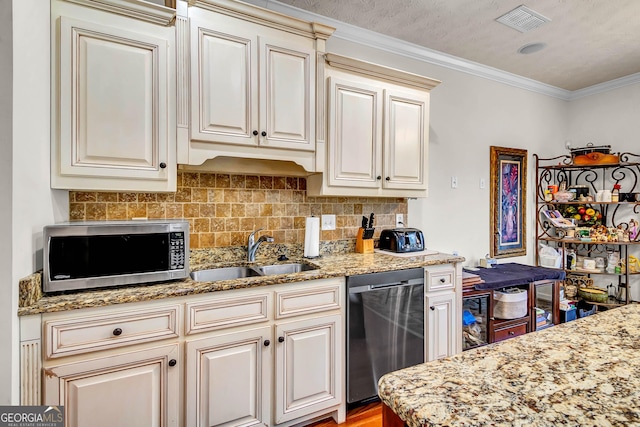 kitchen with light stone counters, appliances with stainless steel finishes, ornamental molding, a sink, and backsplash