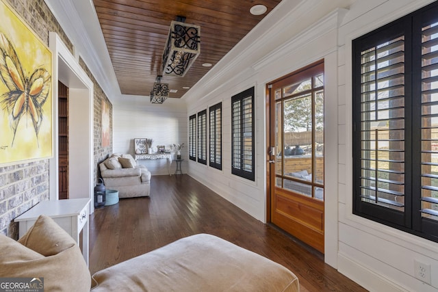 sunroom / solarium featuring wooden ceiling